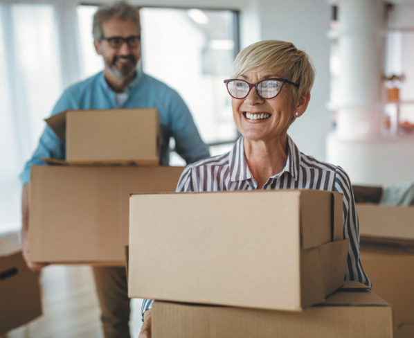 senior couple moving boxes